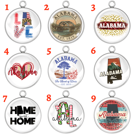 Nine circular pendants with various Alabama-themed designs on a white background.