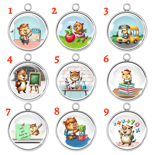 Set of 9 school-themed capybara charms including bus, books, chalkboard, science, math, apple, and more.