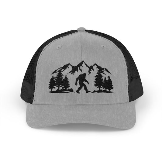 “Believe in the Unknown” Bigfoot Trucker Hat – Mountain Forest Design