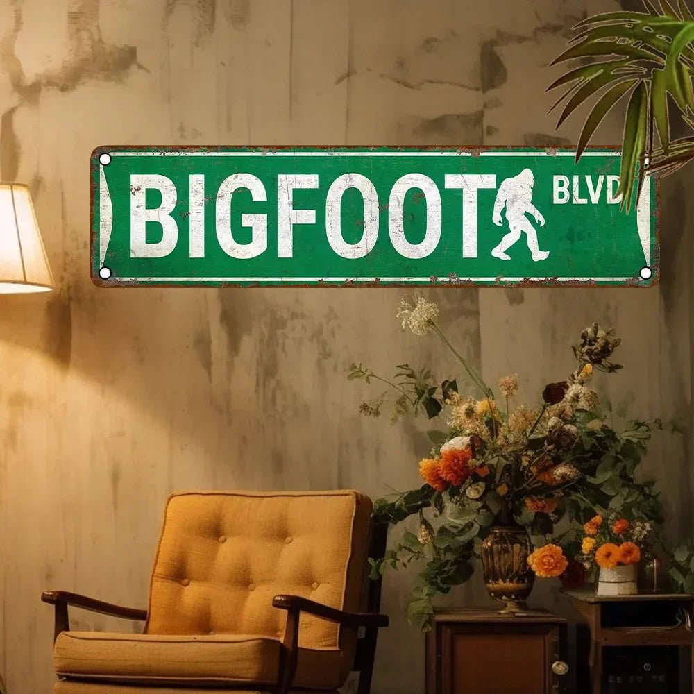 A retro-style UV-printed sign that reads "Bigfoot Blvd" with vintage colors, perfect for quirky wall décor in homes, bars, and game rooms.