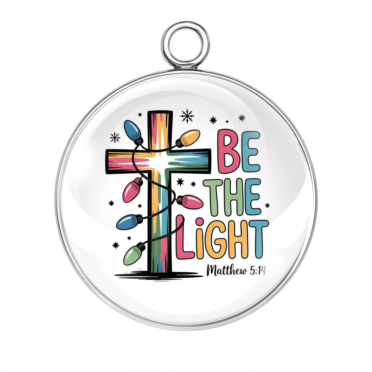 Round pendant with a colorful cross and 'Be the Light' message on a white background