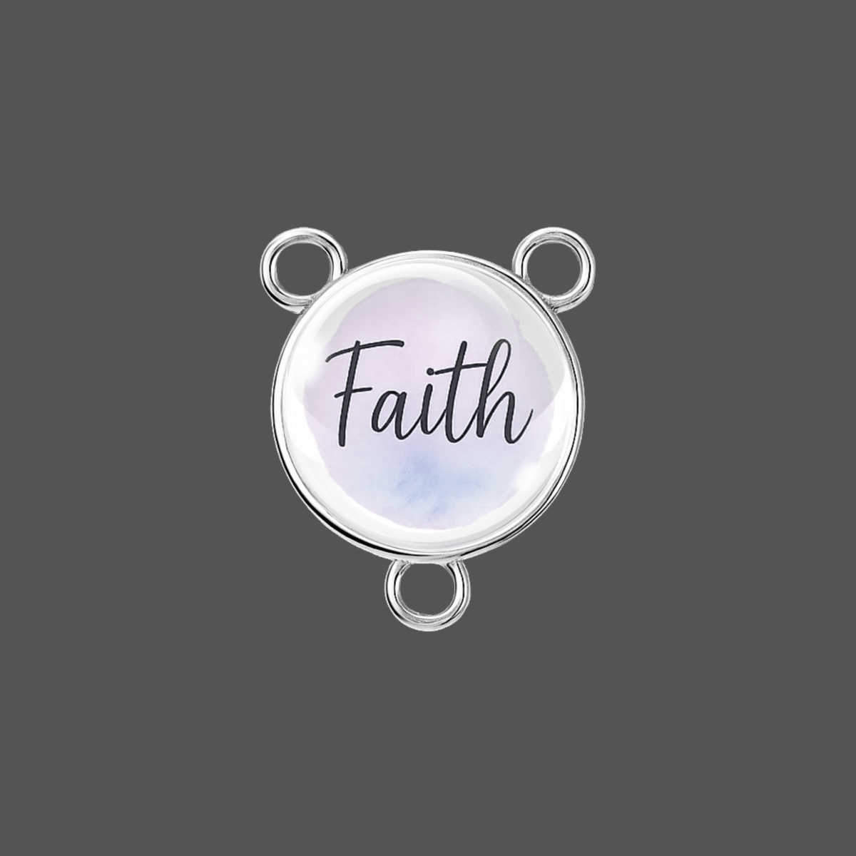 Round silver charm with 'Faith' text on a gray background
