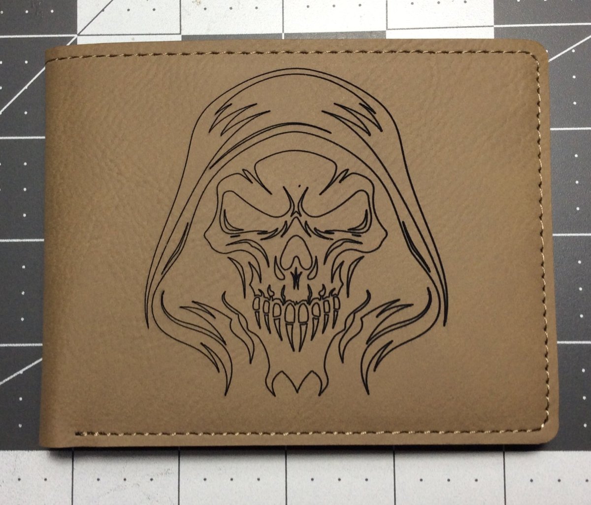 leather wallet with skull engraving
