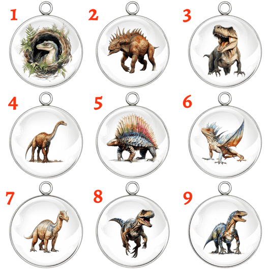 Set of 9 dinosaur-themed glass cabochon charms in stainless steel settings