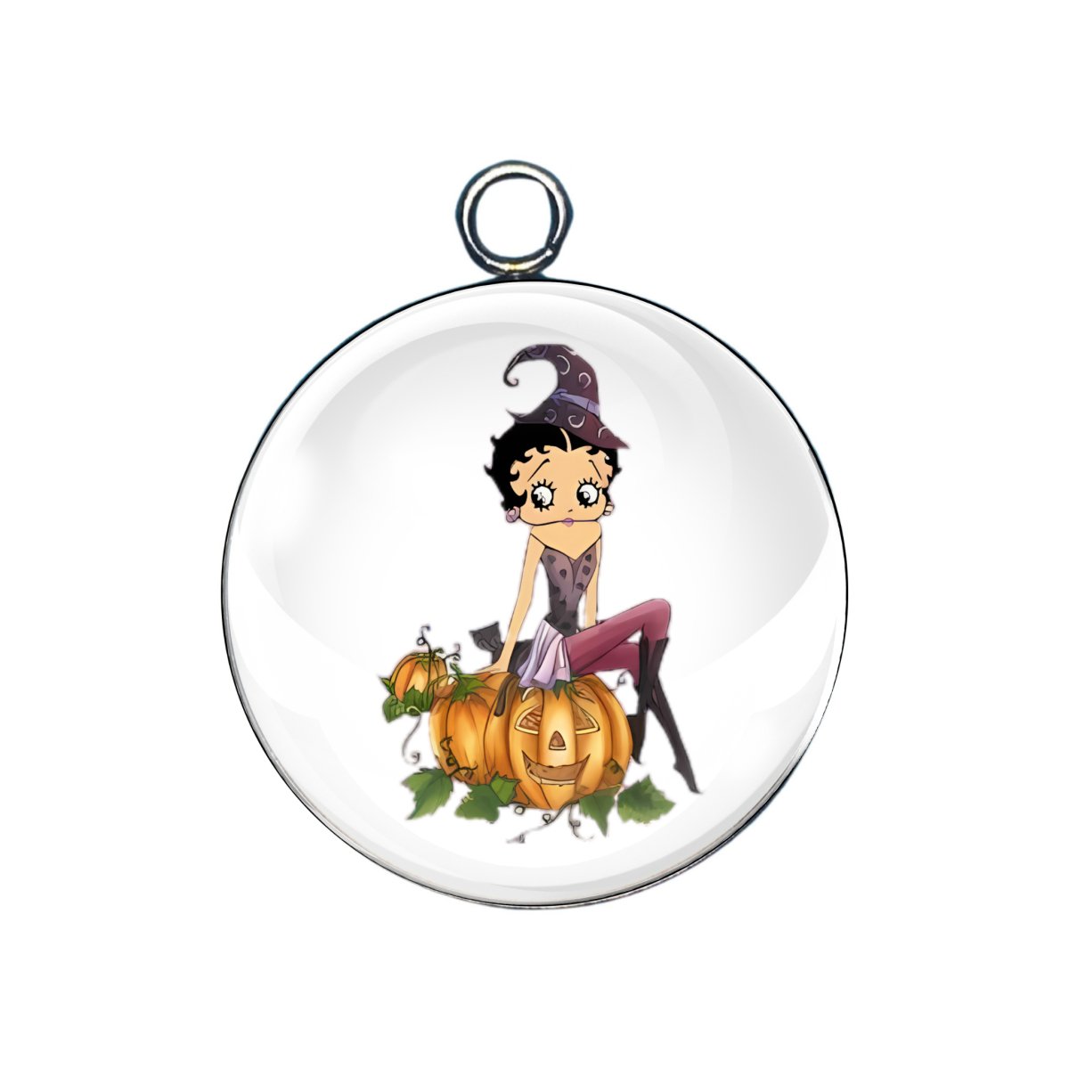 Betty sitting on pumpkins in witch hat and boots