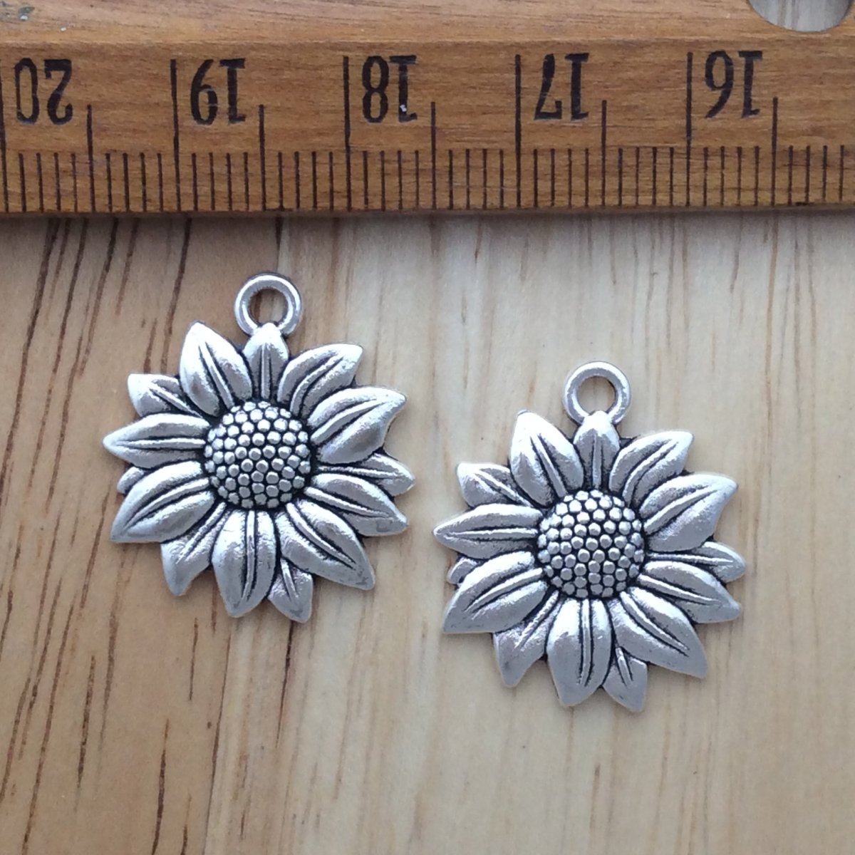 2 tibetan silver sunflower charms