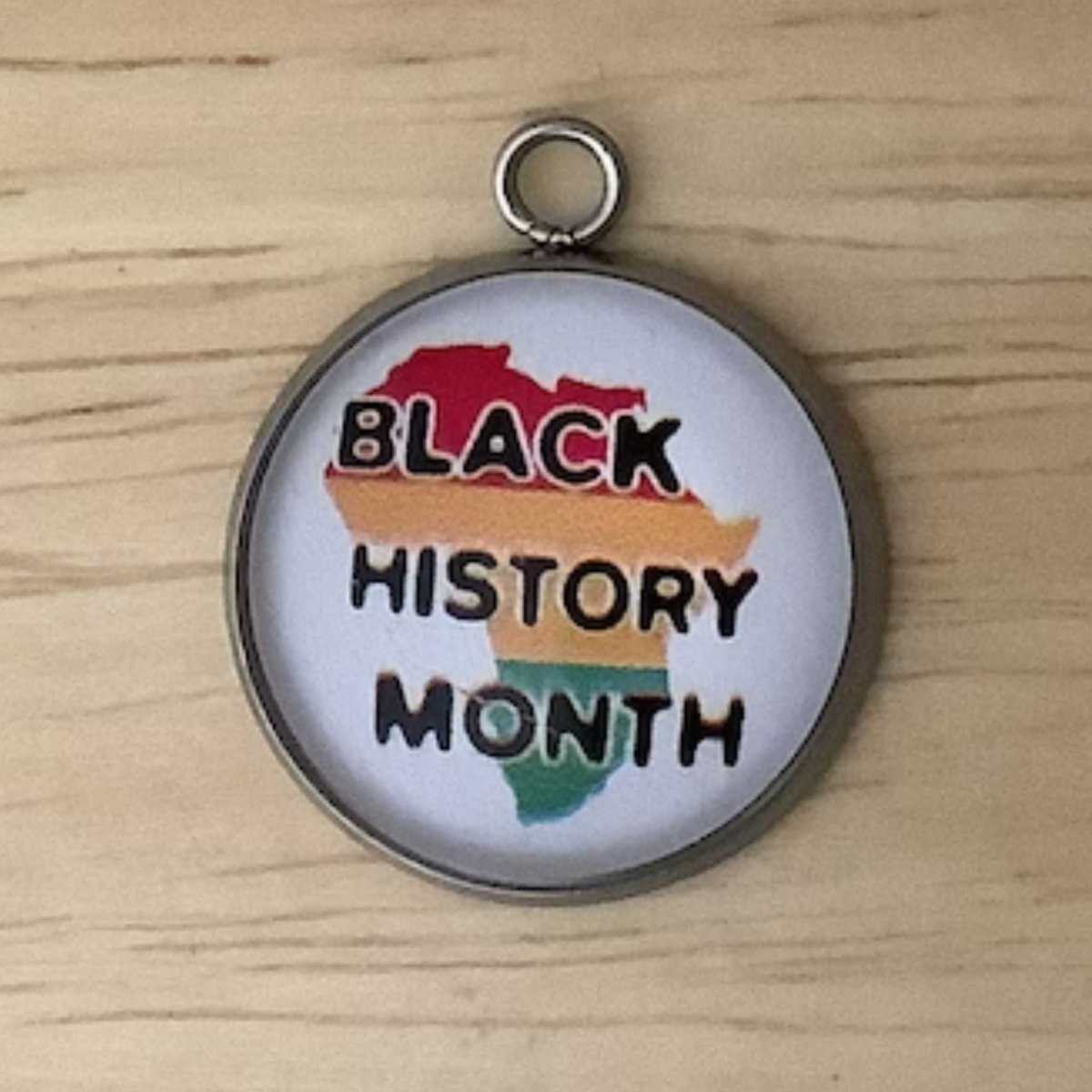 red, yellow, green graphic of Africa with the wording 'black history month'