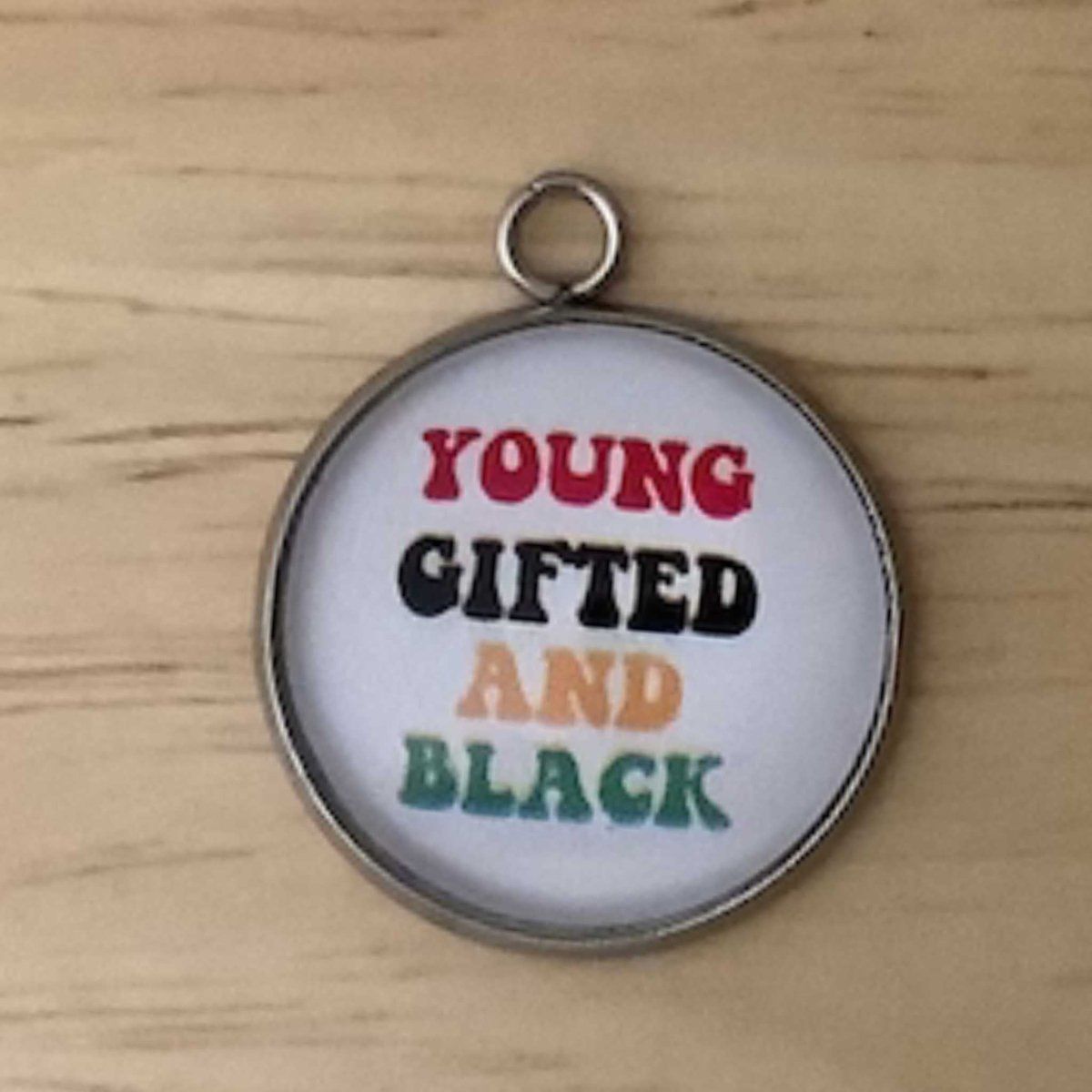 wording 'young gifted and black' in red, black, yellow and green