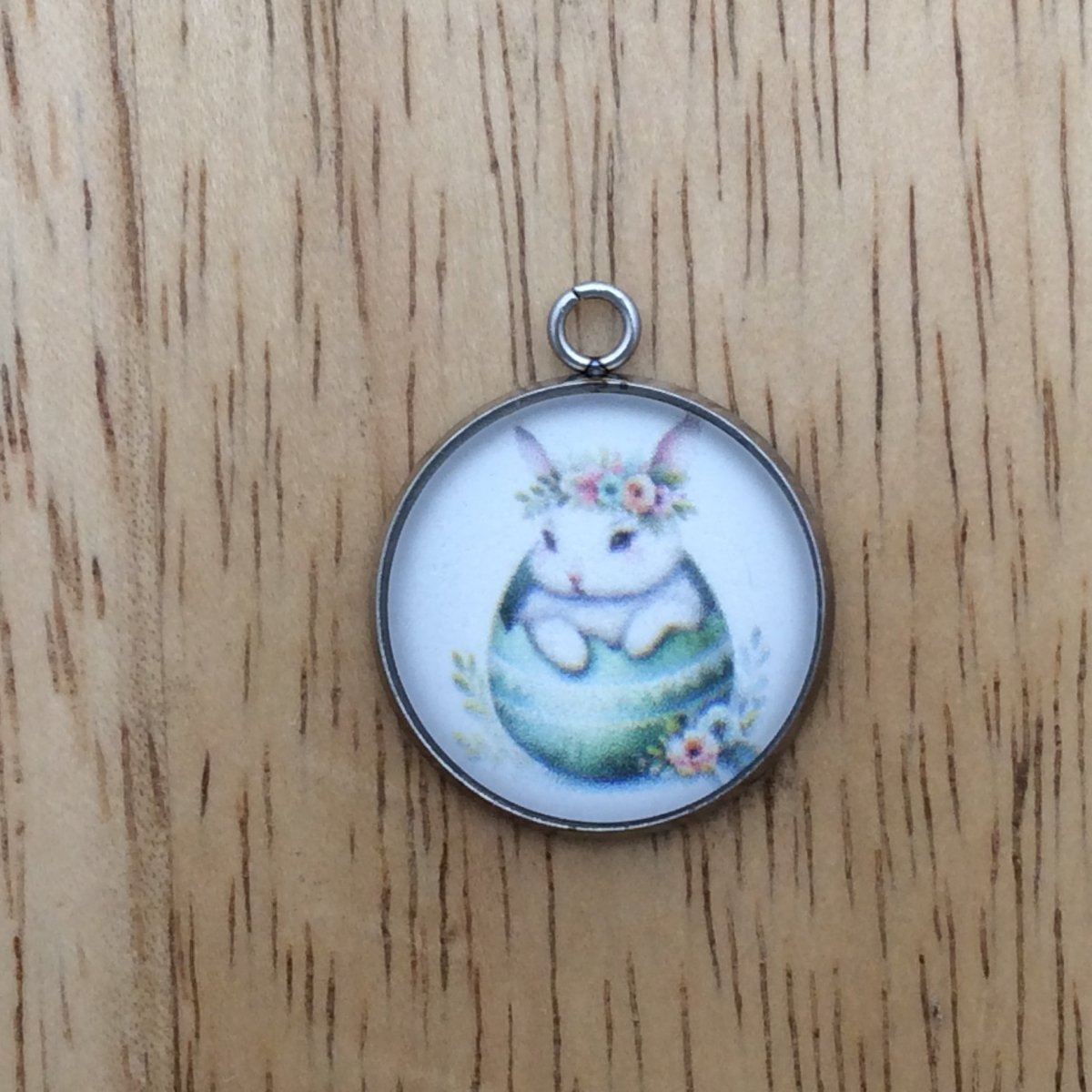 glass cabochon charm with a bunny inside easter egg