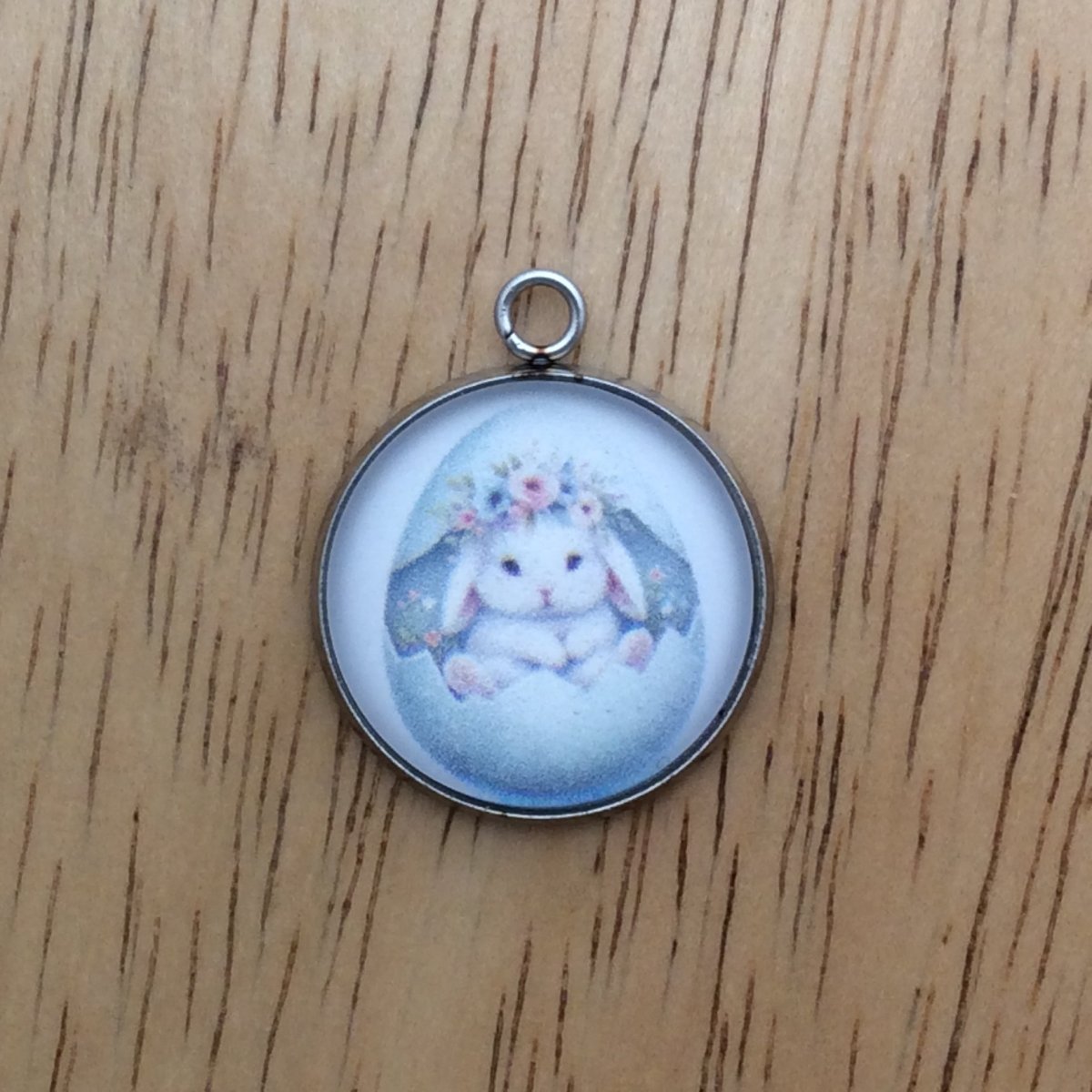glass cabochon charm with a bunny inside easter egg