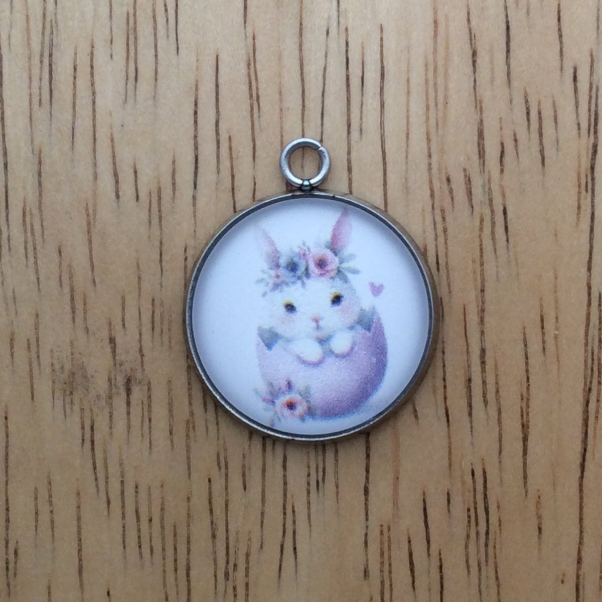 glass cabochon charm with a bunny inside easter egg