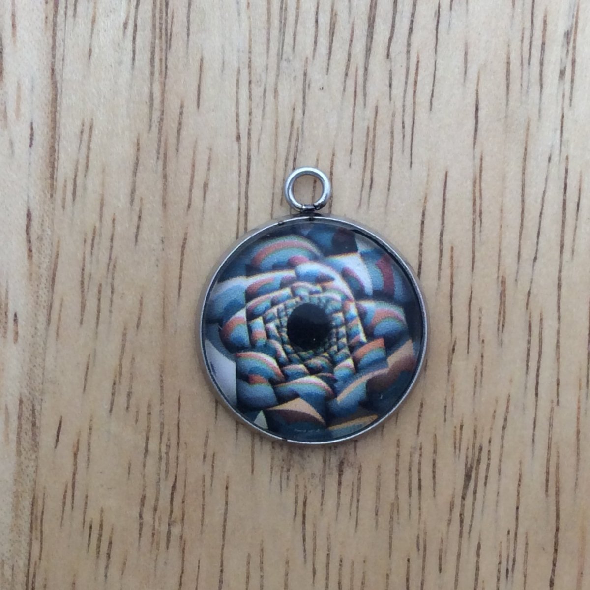 optical illusion glass cabochon charm