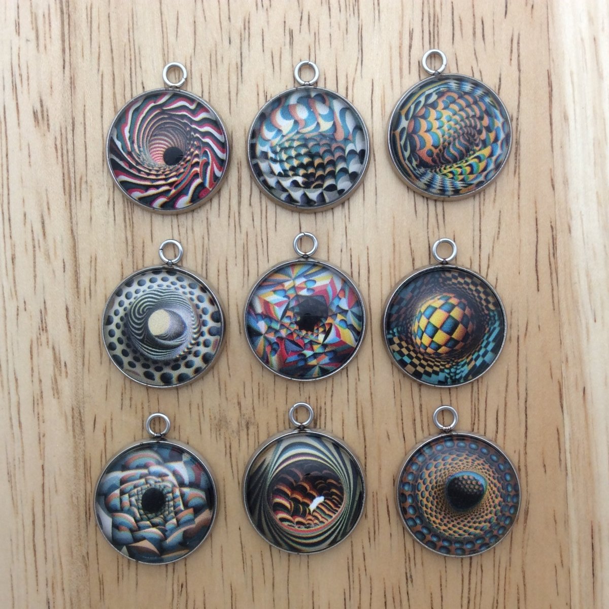 9 optical illusion glass cabochon charms