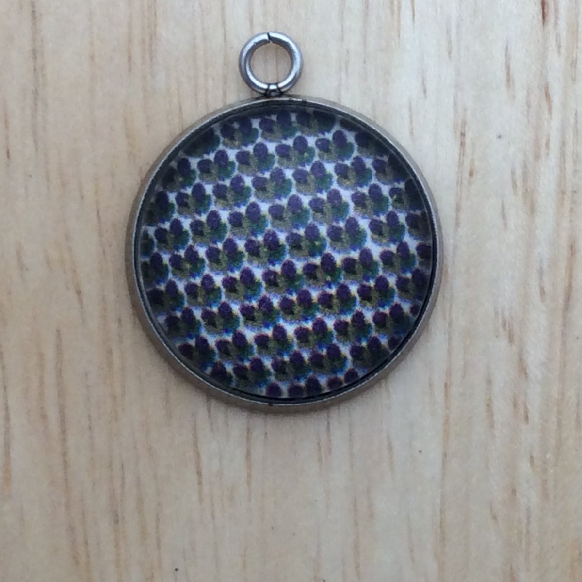 glass cabochon charm with yellow, green and Purple Hearts