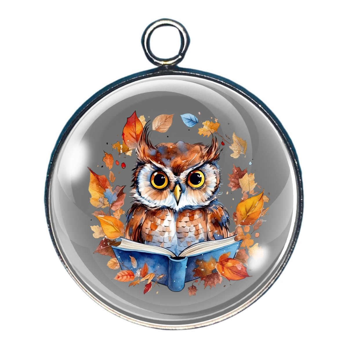 charm depicting an owl reading a book  in a ring of leaves