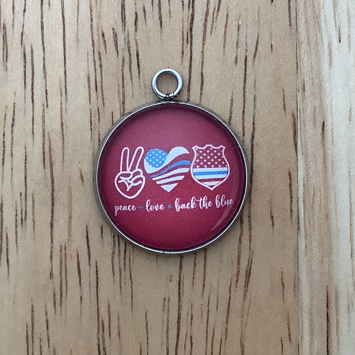 Charm featuring: Peace, Love and back the vlue