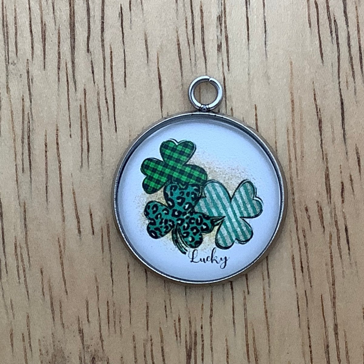 3 shamrocks with the word 'lucky' underneath