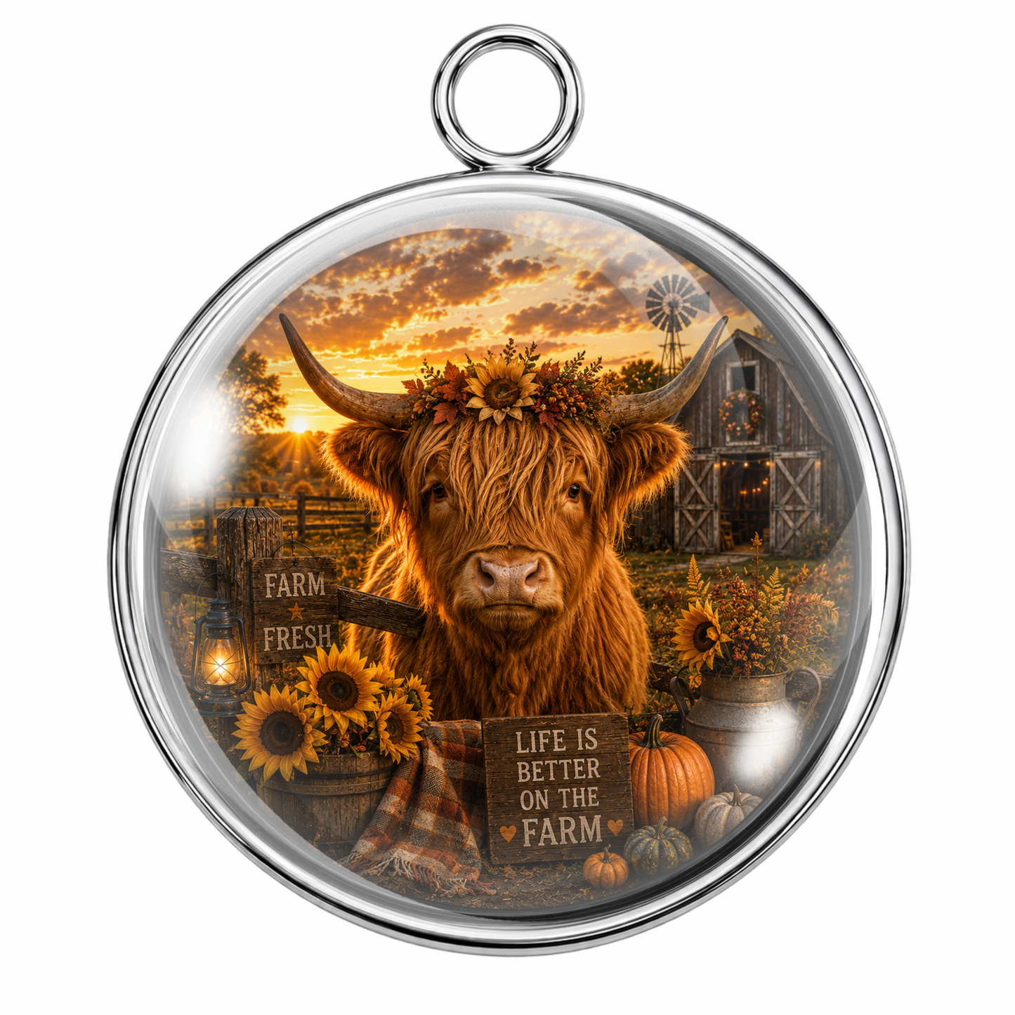 Round silver-toned pendant with a clear domed insert featuring a rustic farm scene: a shaggy Highland cow in the center, sunflowers, pumpkins, a barn, windmill, and warm sunset sky. The pendant has a hanging loop at the top and is shown on a plain white background.