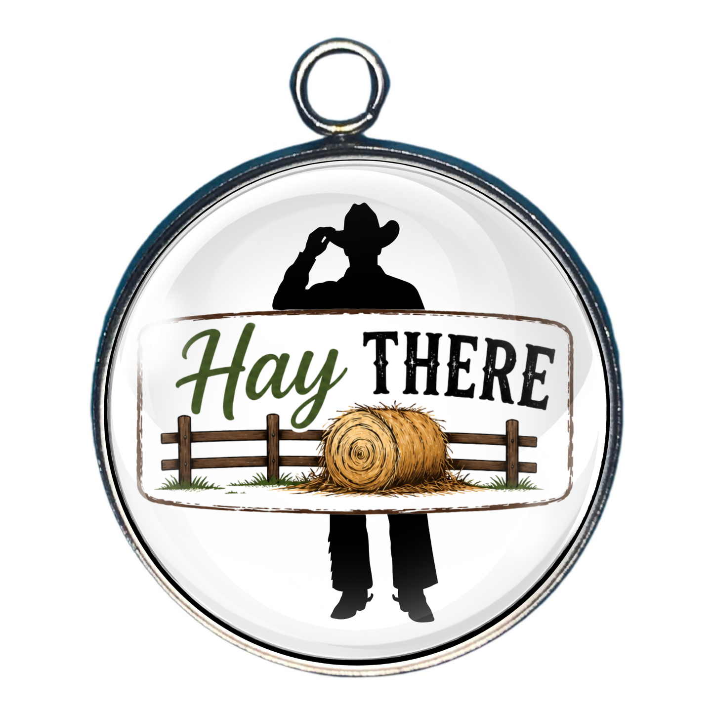 Charm of a cowboy silhouette behind a fence and a hay bale design, featuring the text 'Hay THERE'.