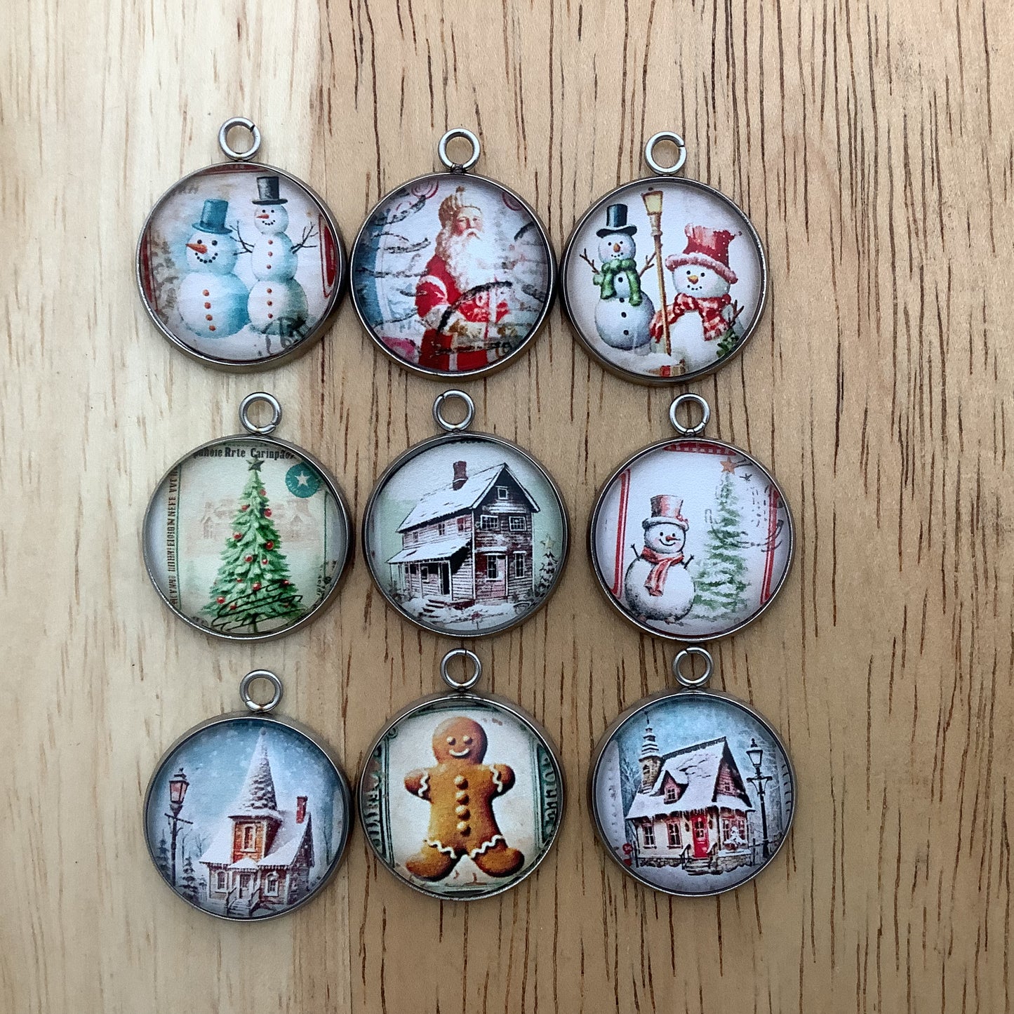 Set of nine nostalgic Christmas stamp design charms