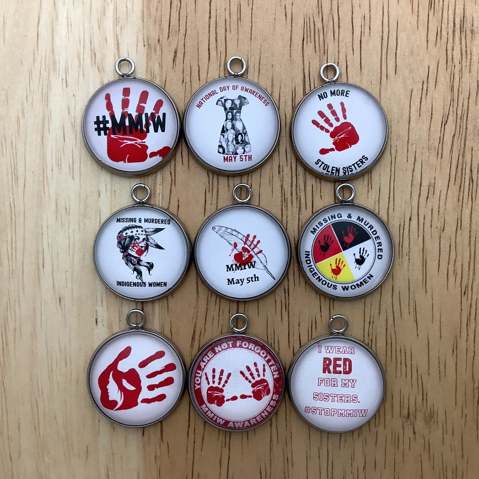 Group of 9 MMIW charms