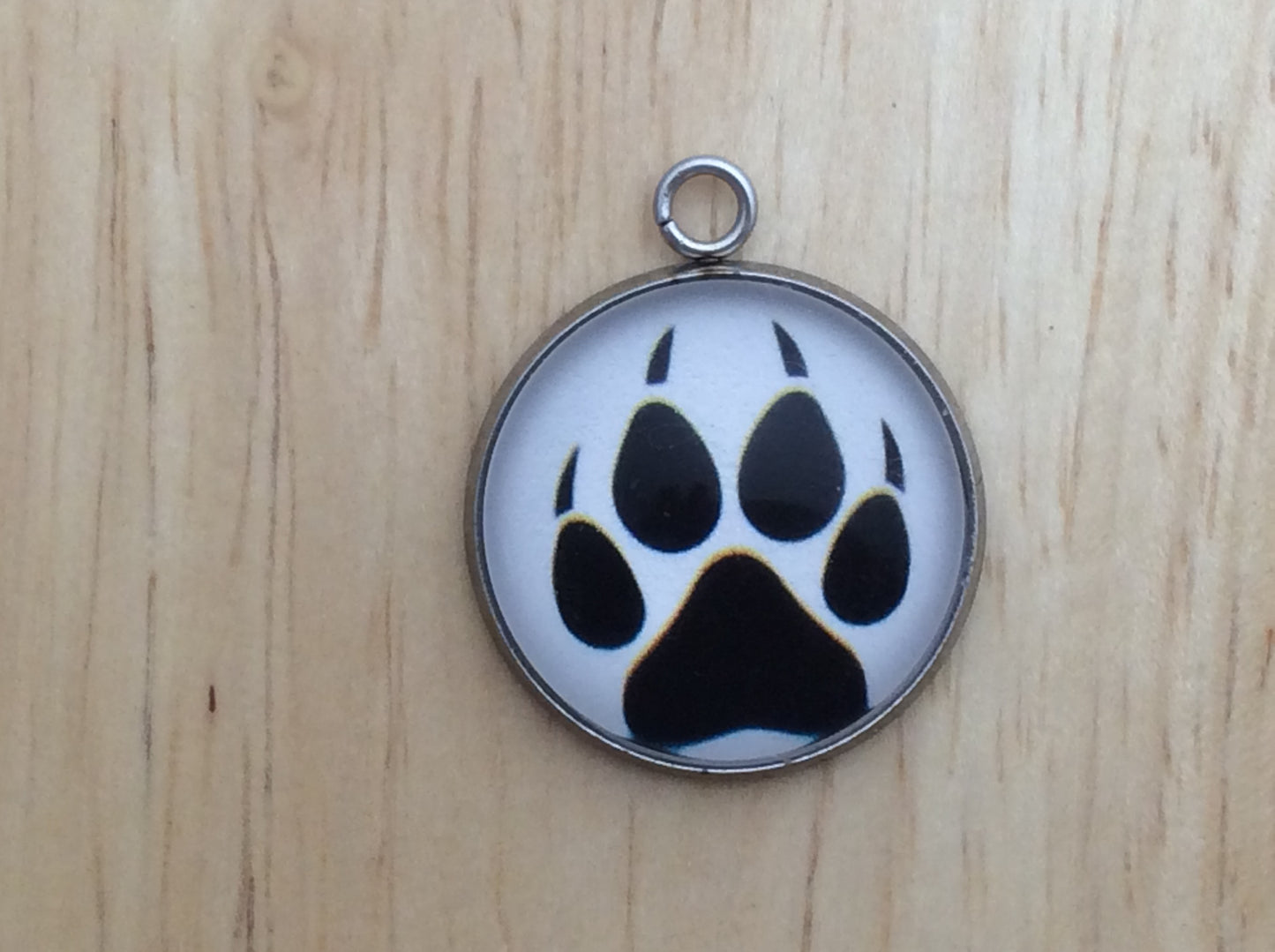 wolf print charm