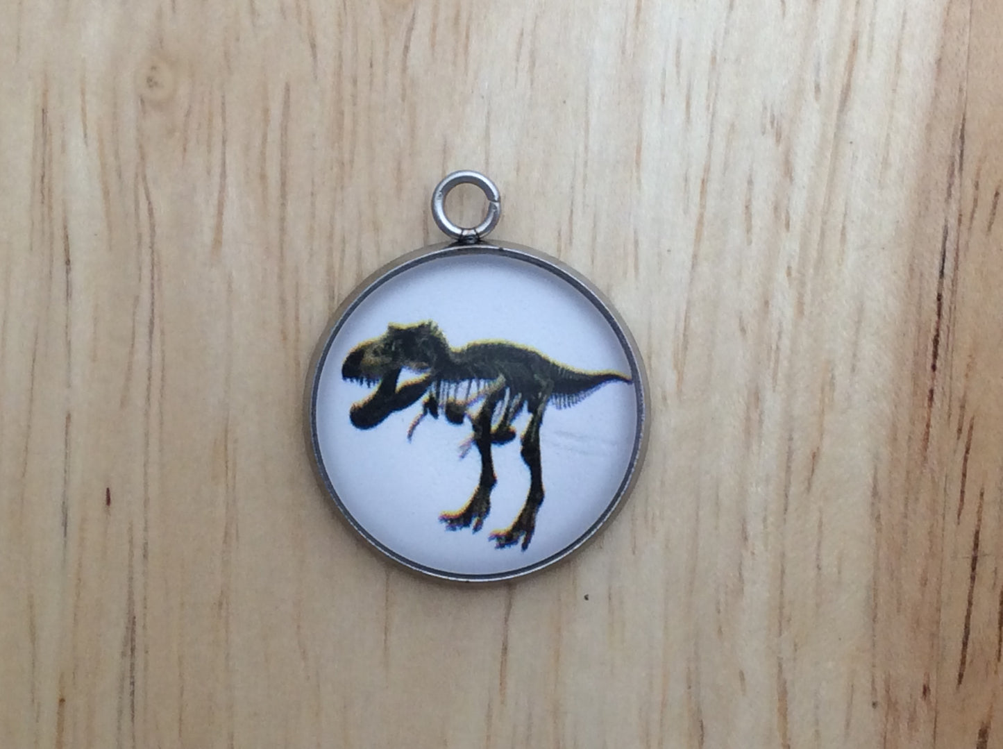 t - rex skeleton charm