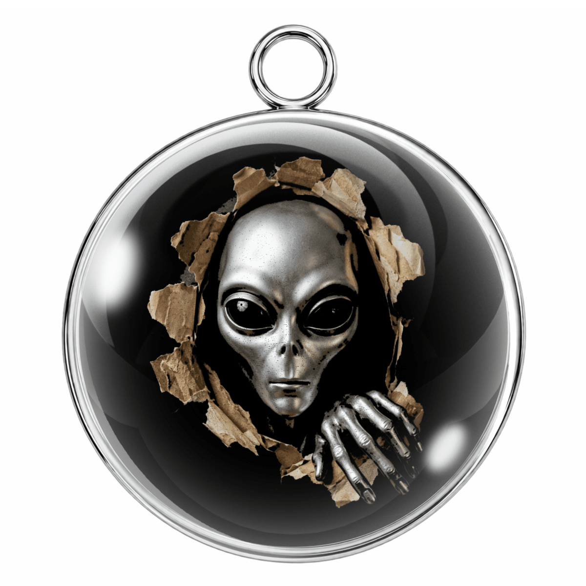 Pendant with alien design on a black background