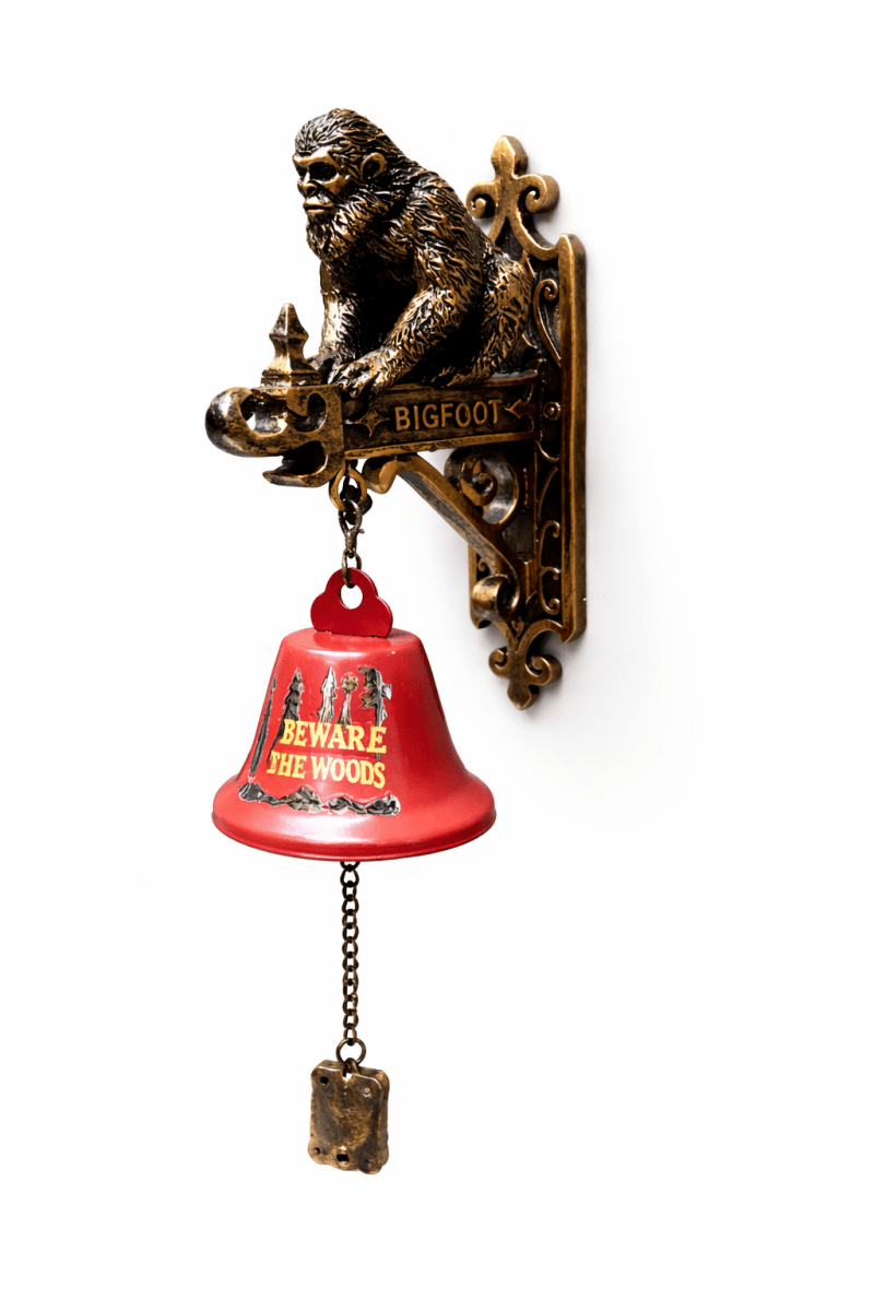 Decorative wall bell with Bigfoot design on a white background