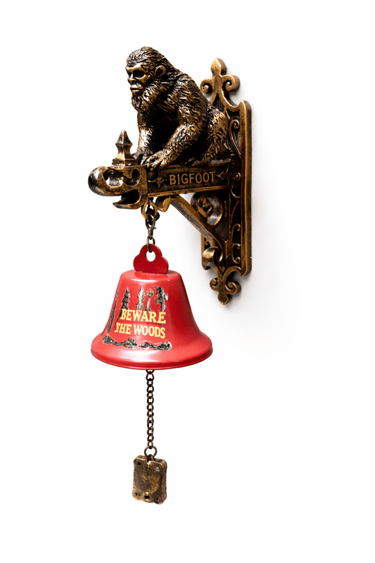 Decorative wall bell with Bigfoot design on a white background