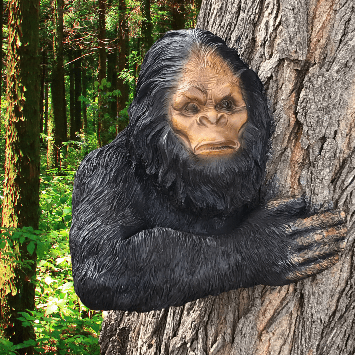 Sasquatch figure clinging to a tree in a forest setting