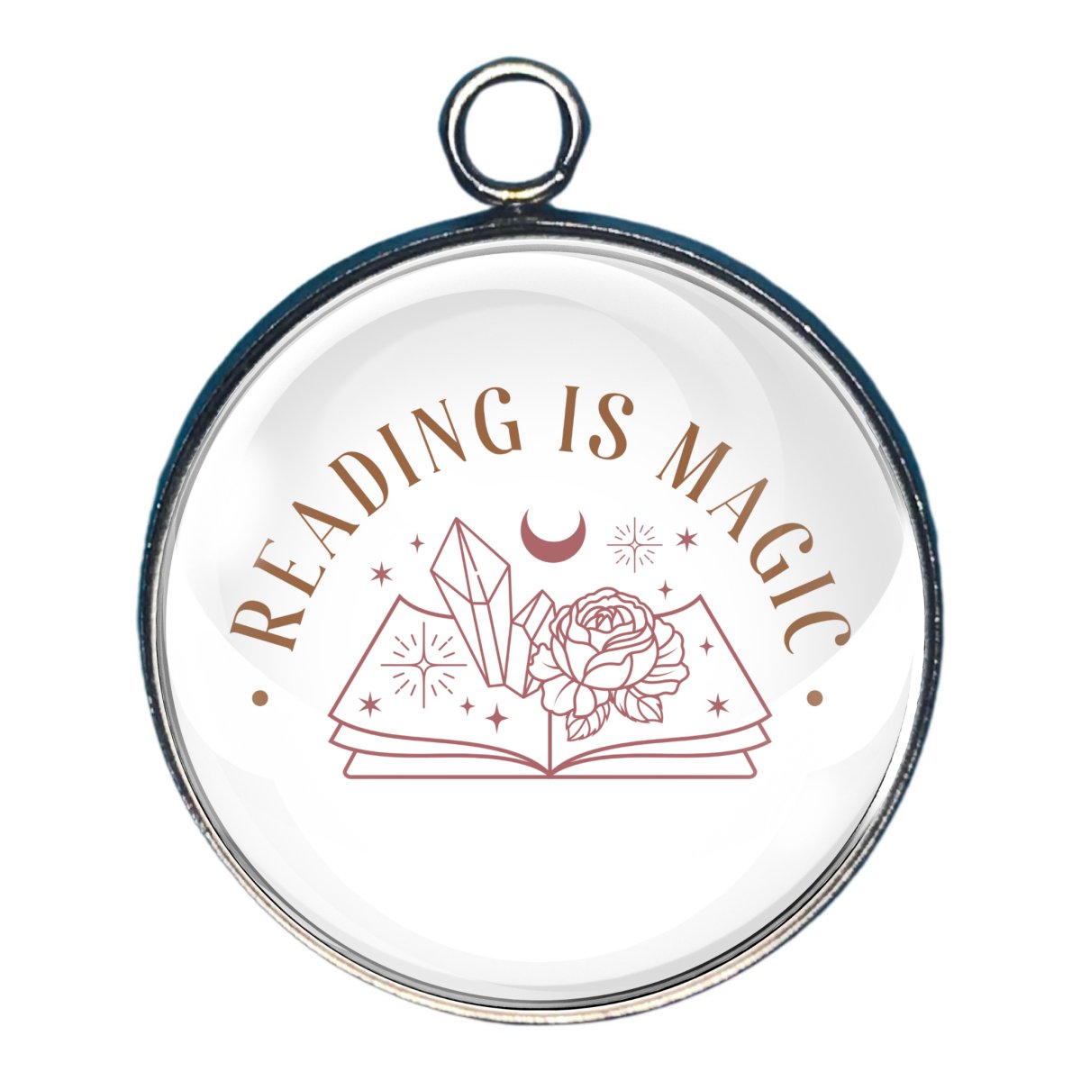 Charm with the words 'reading is magic' and a book with cristals and a flower