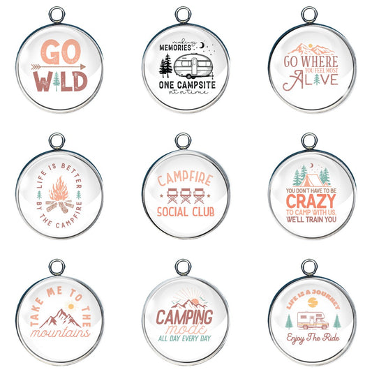 Group of 9 charms depicting camping scenes