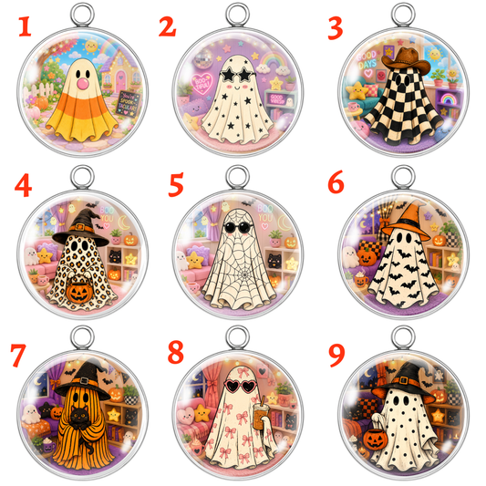 Nine circular pendant designs arranged in a 3x3 grid, each labeled with a red number from 1 to 9. The pendants feature cartoon ghost characters in Halloween-themed outfits, including candy corn, checkered patterns, spiderwebs, leopard print, and poncho styles, all set against colorful room backdrops with pumpkins and shelves.