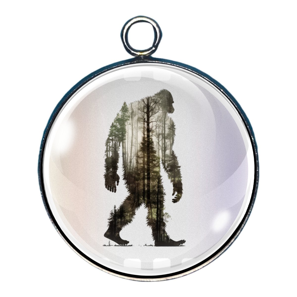 Charm of a Bigfoot outline filled in with a wooded scene