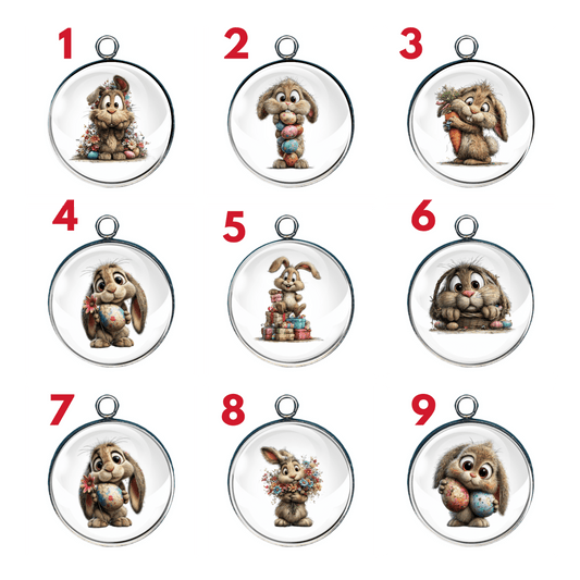 Easter bunny charm collection featuring nine whimsical rabbit designs with pastel eggs, flowers, carrots, gifts, and baskets