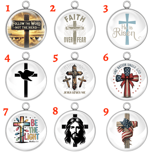 Nine religious-themed pendants with various designs on a white background.