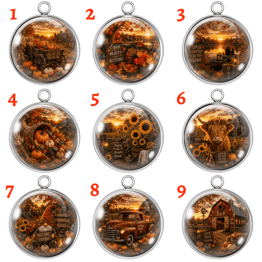 Nine circular autumn-themed glass cabochon charms or pendants arranged in a 3x3 grid on a white background, each with a red number 1 through 9. The designs depict fall harvest scenes including pumpkins, corn, sunflowers, a horse, a vintage truck, and a barn, all enclosed in clear domed cases with silver metal rims and hanging loops.