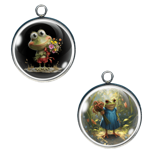 two frog charms, one is a boy holding a boquet of flowers, the girl is holding a bouquet of worms