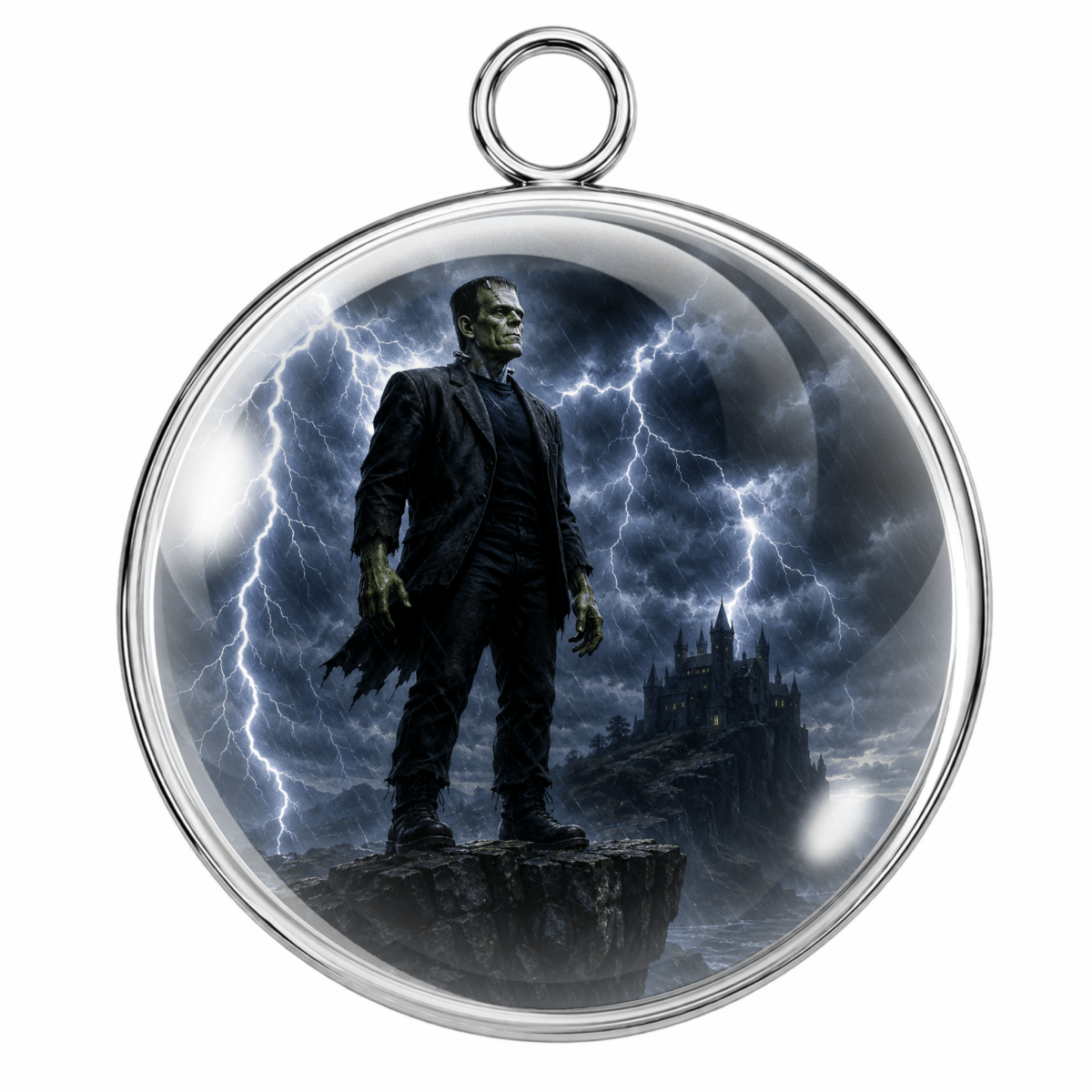 A round silver pendant with a hanging loop at the top, featuring a printed fantasy scene of a green-skinned man in a black suit standing on a cliff with lightning and a castle in the background.