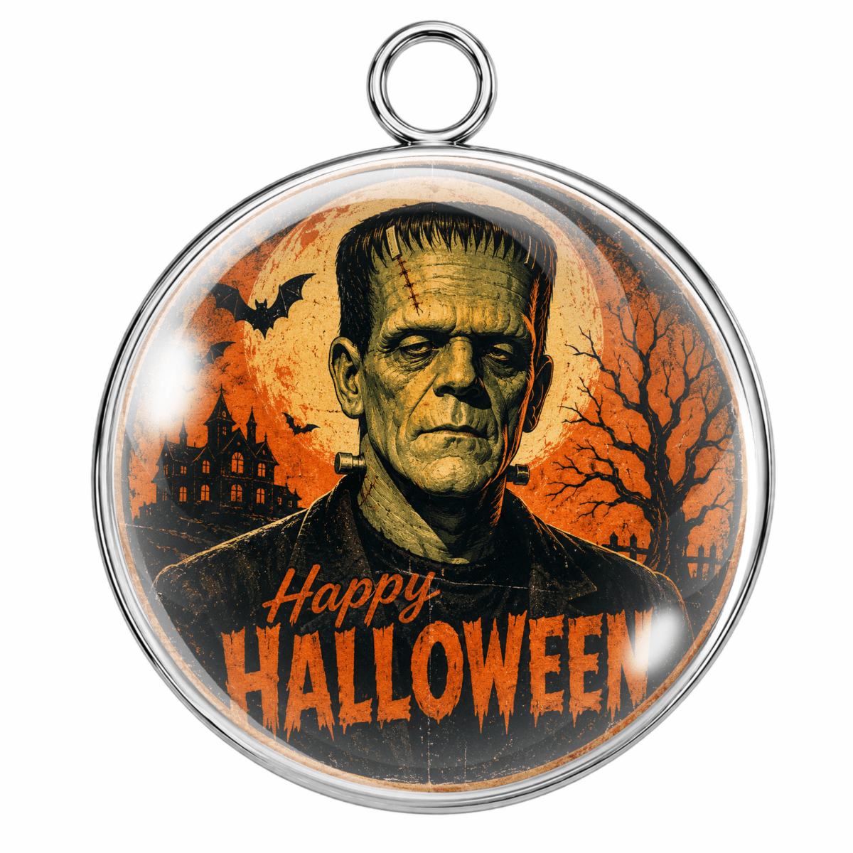A round silver pendant with a hanging loop at the top, featuring a Halloween-themed printed design of Frankenstein's monster with 'Happy Halloween' text on an orange background.