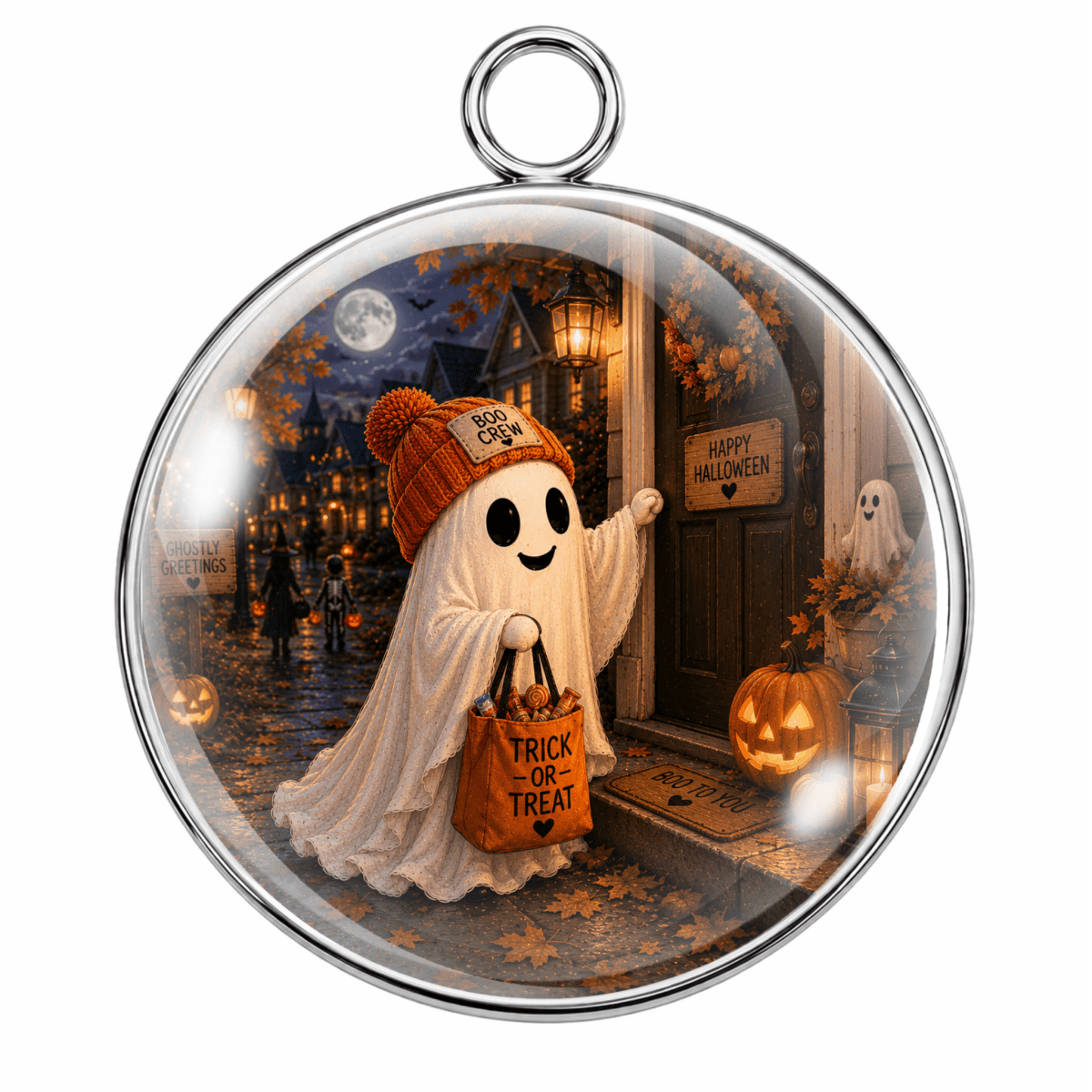 Round glass pendant with a silver-tone metal rim and hanging loop, featuring a Halloween-themed illustrated scene of a ghost in an orange beanie holding a Trick or Treat bag in front of a haunted house at night.