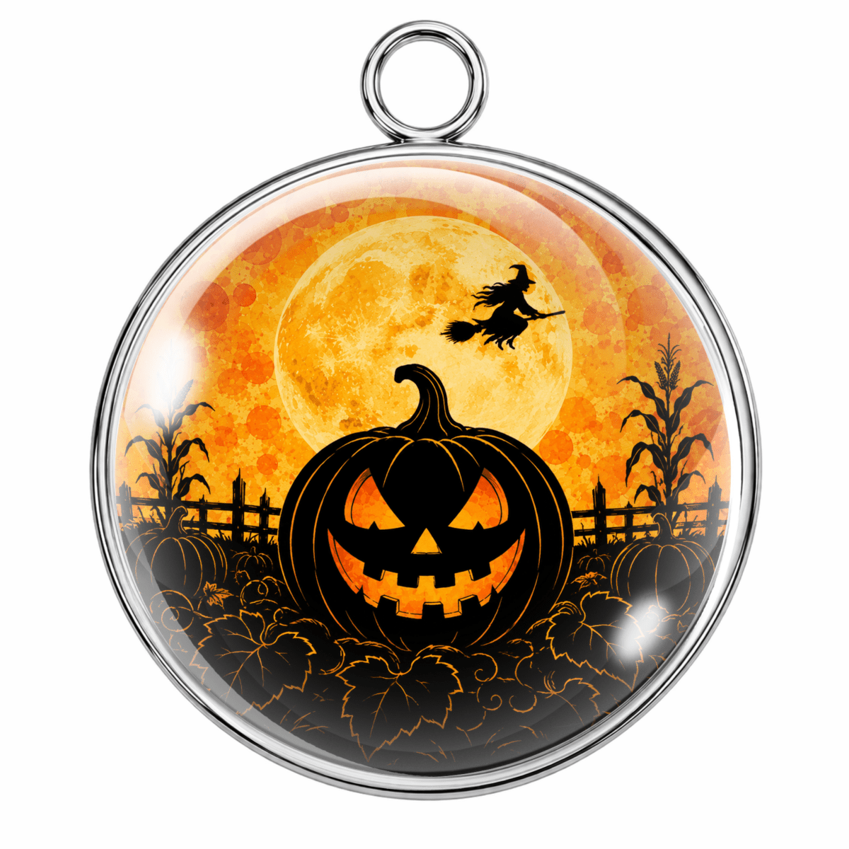 Round silver-toned pendant with a hanging loop, featuring a Halloween scene under a large orange full moon: a carved jack-o'-lantern in the foreground, a witch on a broomstick, and cornstalks against a black background.