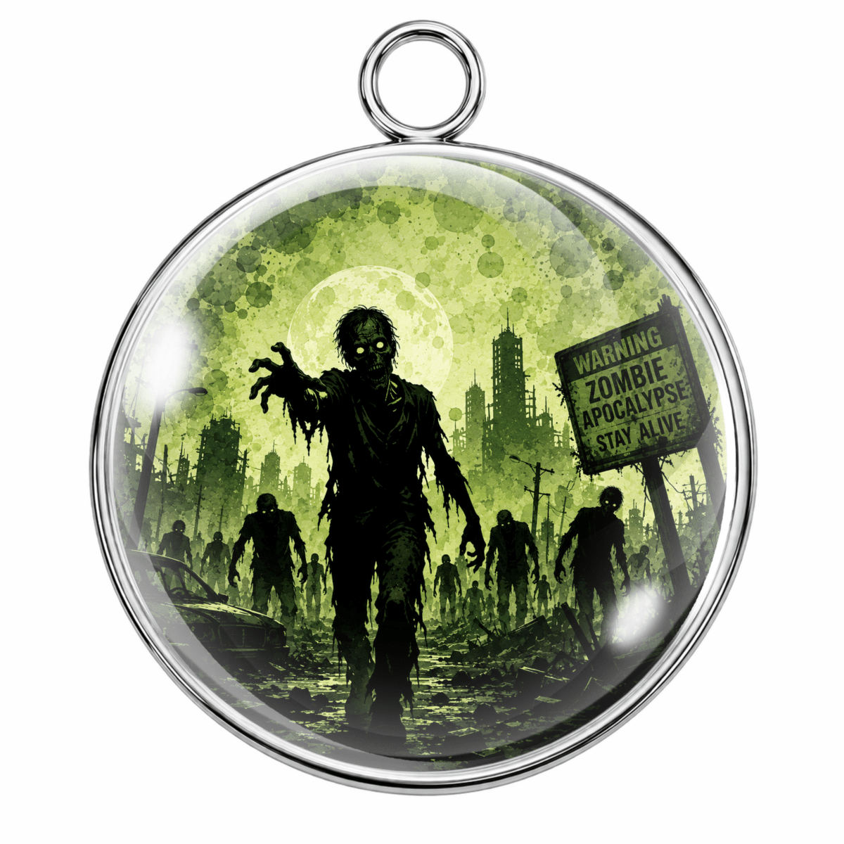 Round pendant with a silver-tone metal rim and hanging loop, featuring a zombie apocalypse scene in green and black with a warning sign and moonlit city background.