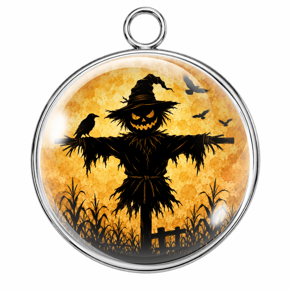 Round silver pendant featuring a Halloween scarecrow design with a jack-o'-lantern face, crows, corn, and a dark orange textured background, shown on a white background.