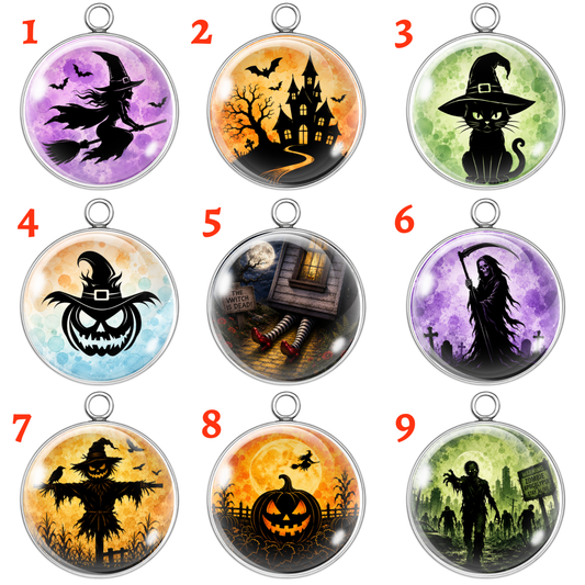Nine Halloween-themed round pendant designs arranged in a 3x3 grid on a white background, each with a silver-toned metal rim and loop at the top. Red numbers 1 through 9 label each design.