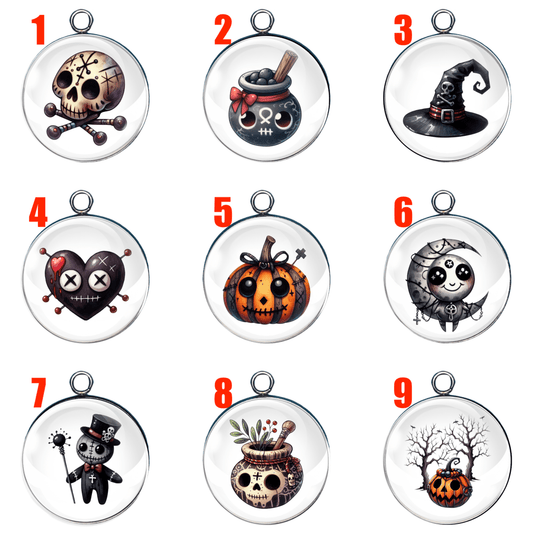 Halloween voodoo charm set with skulls, pumpkins, witches and spooky designs in glass cabochons