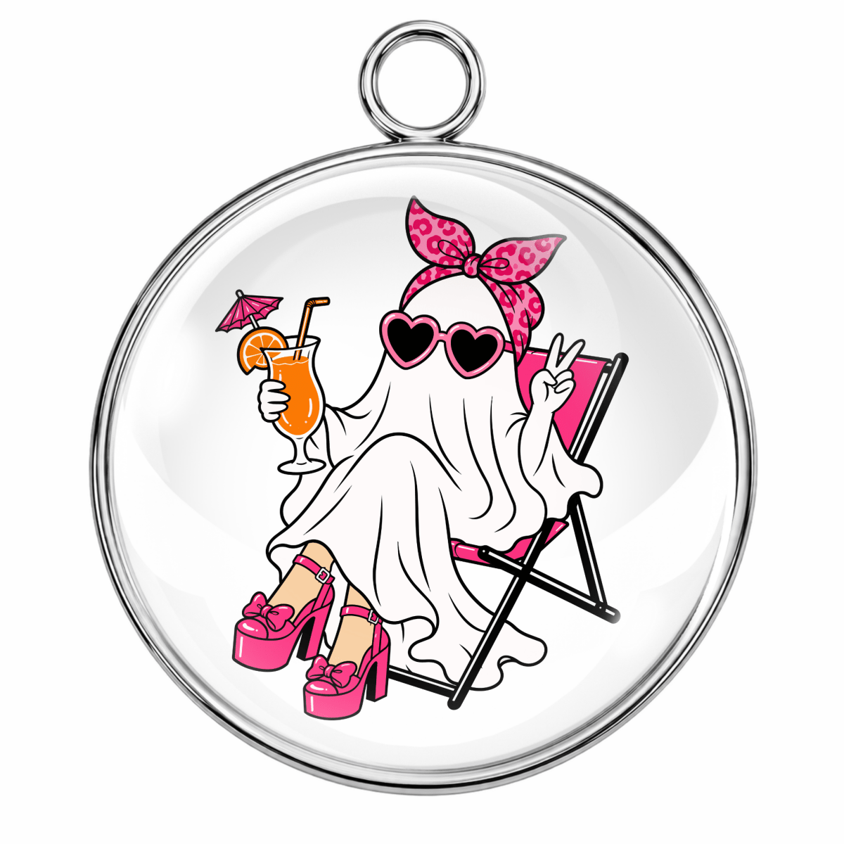 A round silver-toned pendant or charm with a clear domed surface featuring a cartoon ghost lounging in a pink beach chair, wearing pink sunglasses, a pink leopard-print bow, and pink high heels, with an orange cocktail in one hand. The pendant is shown on a plain white background.