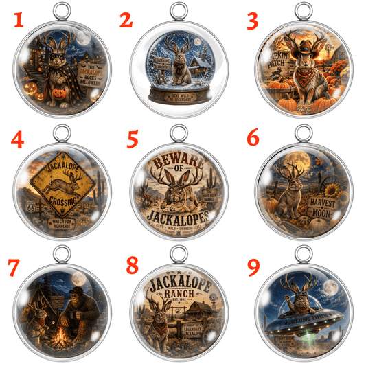 Nine numbered oval pendant charms featuring Jackalope-themed illustrated scenes, arranged in a 3x3 grid on a white background. Each charm has a silver-toned border and a small hanging loop at the top.