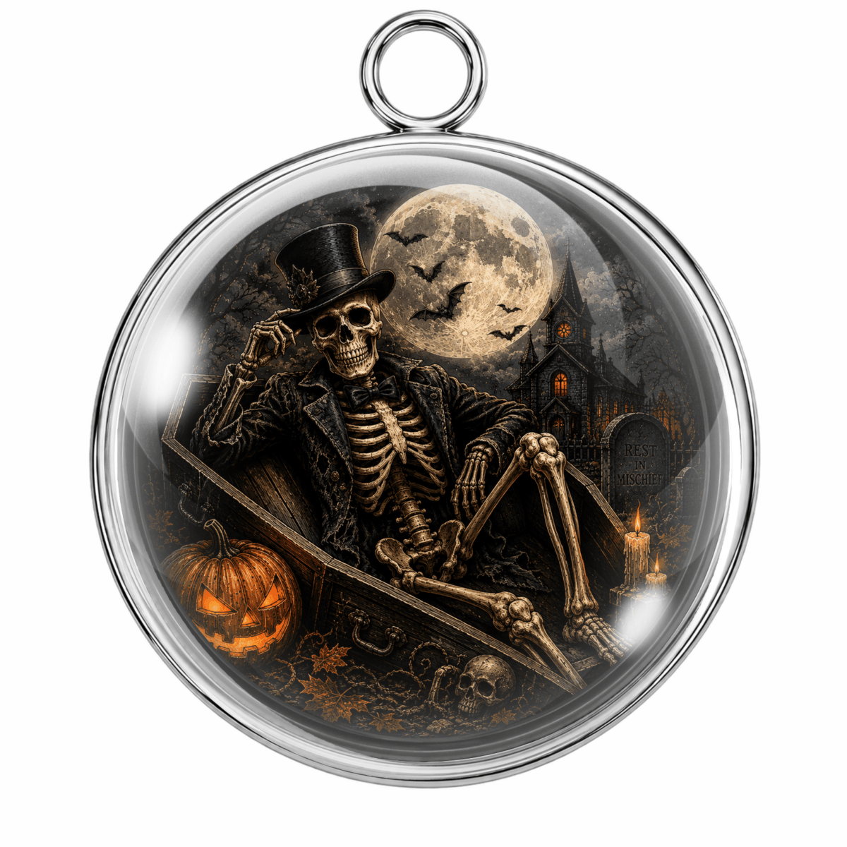 Round silver-toned pendant with a clear domed glass cover featuring a Halloween scene of a skeleton in a top hat beside a carved pumpkin, with a full moon, bats, and haunted house in the background.